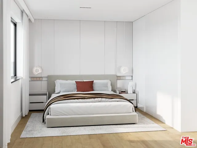 a bedroom with a bed and closet