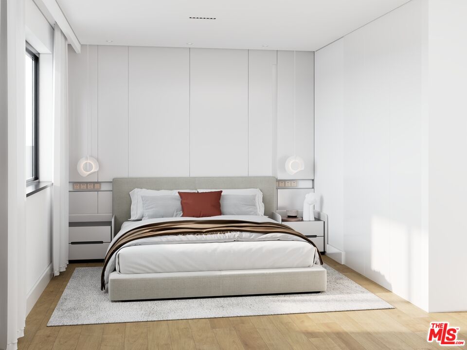 448 Beech Street Los Angeles, CA 90065 - Photo 9 of 31 a bedroom with a bed and closet