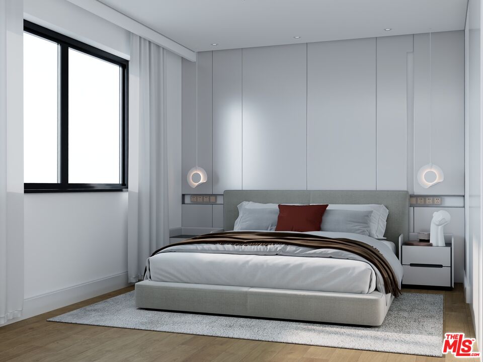 448 Beech Street Los Angeles, CA 90065 - Photo 10 of 31 a bedroom with a bed and window