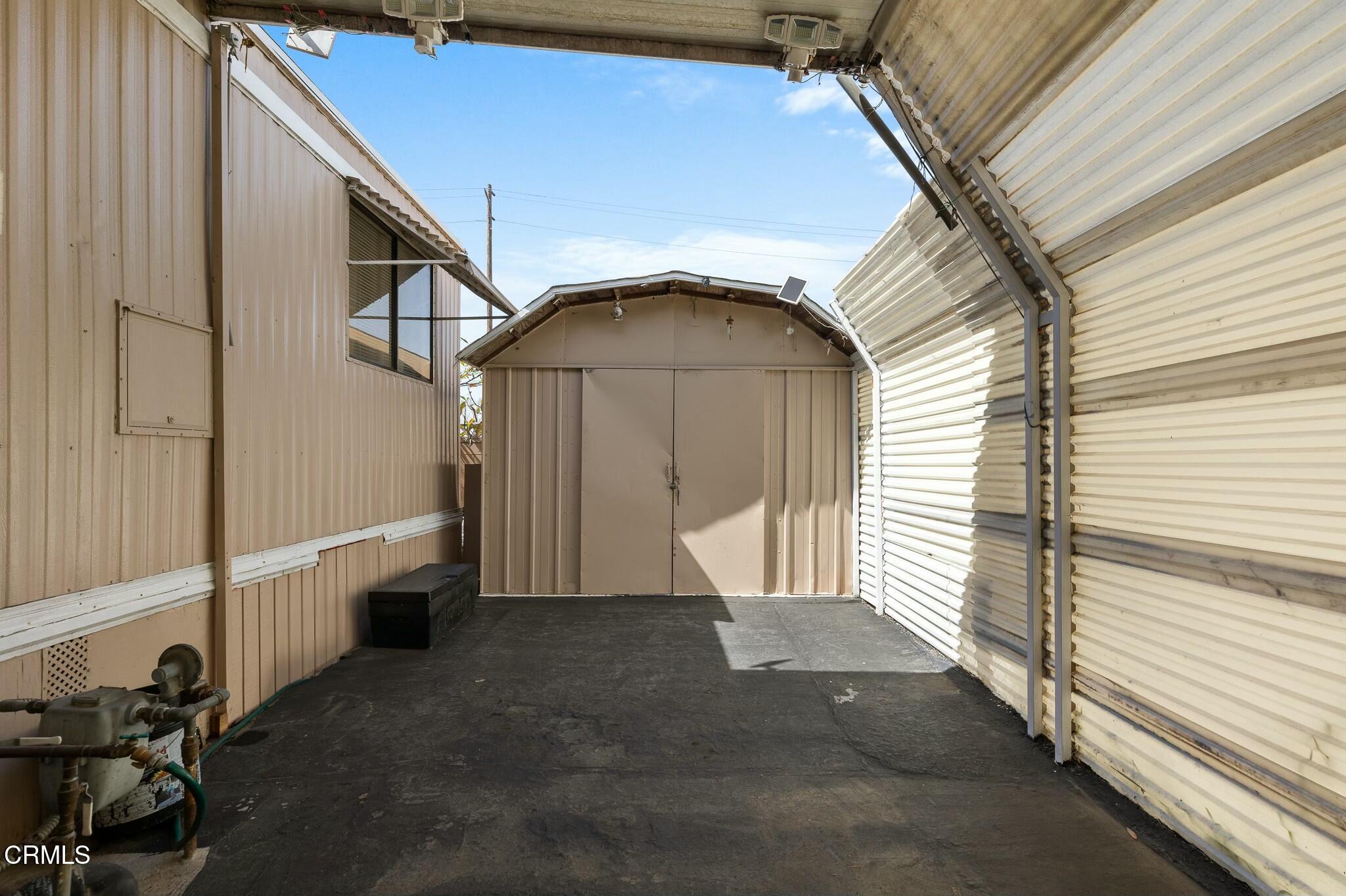 1853 Ives Avenue, Unit 51 Oxnard, CA 93033 - Photo 25 of 38 a view of backyard with cabin
