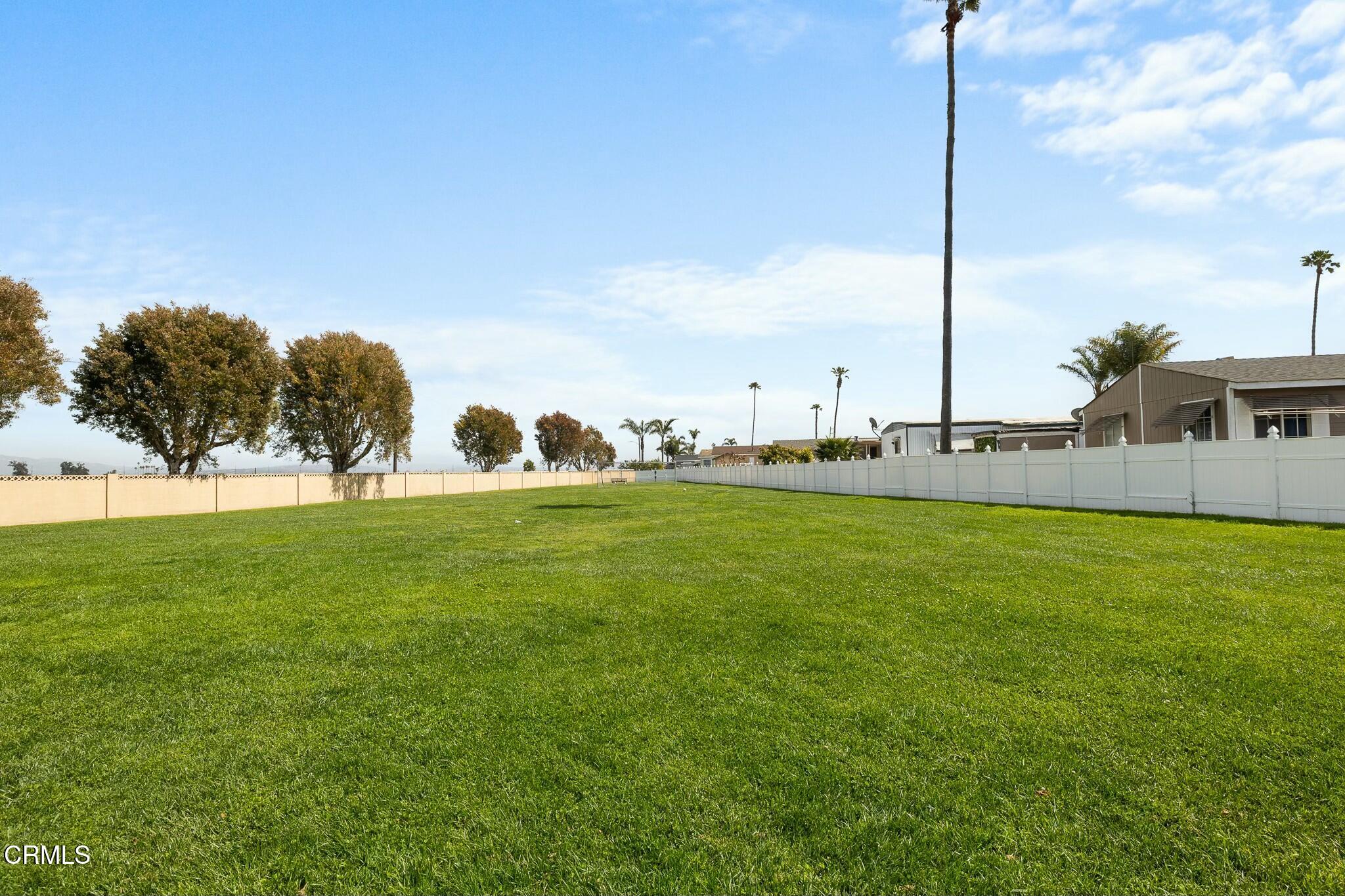 1853 Ives Avenue, Unit 51 Oxnard, CA 93033 - Photo 27 of 38 a lake view with residential house