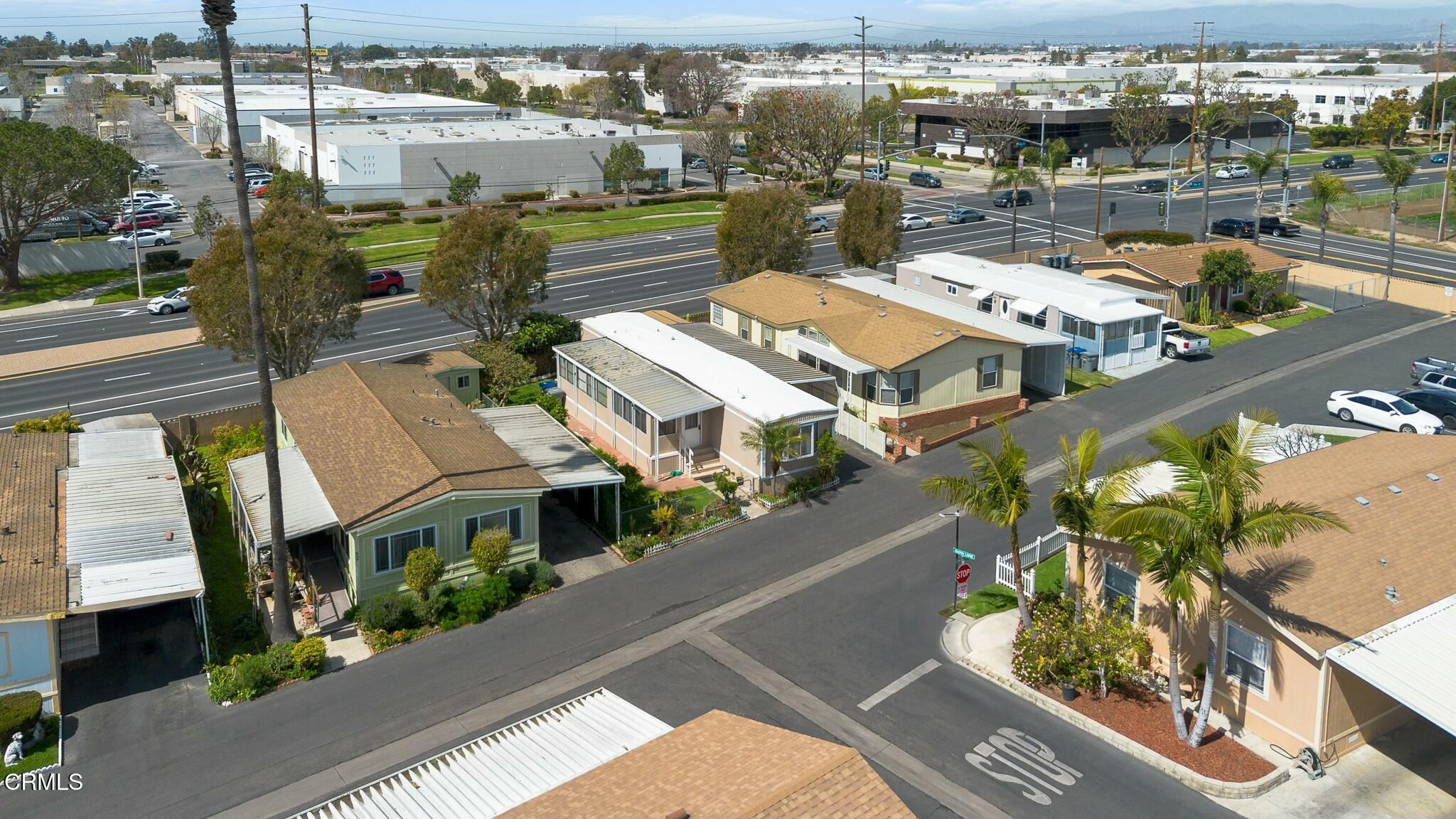 1853 Ives Avenue, Unit 51 Oxnard, CA 93033 - Photo 31 of 38 an aerial view of a house with yard swimming pool and outdoor seating