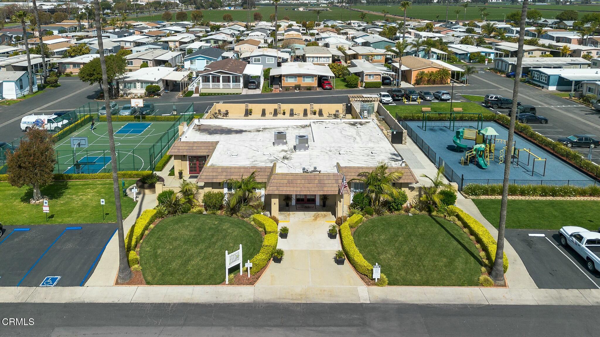1853 Ives Avenue, Unit 51 Oxnard, CA 93033 - Photo 34 of 38 an aerial view of a swimming pool with outdoor space