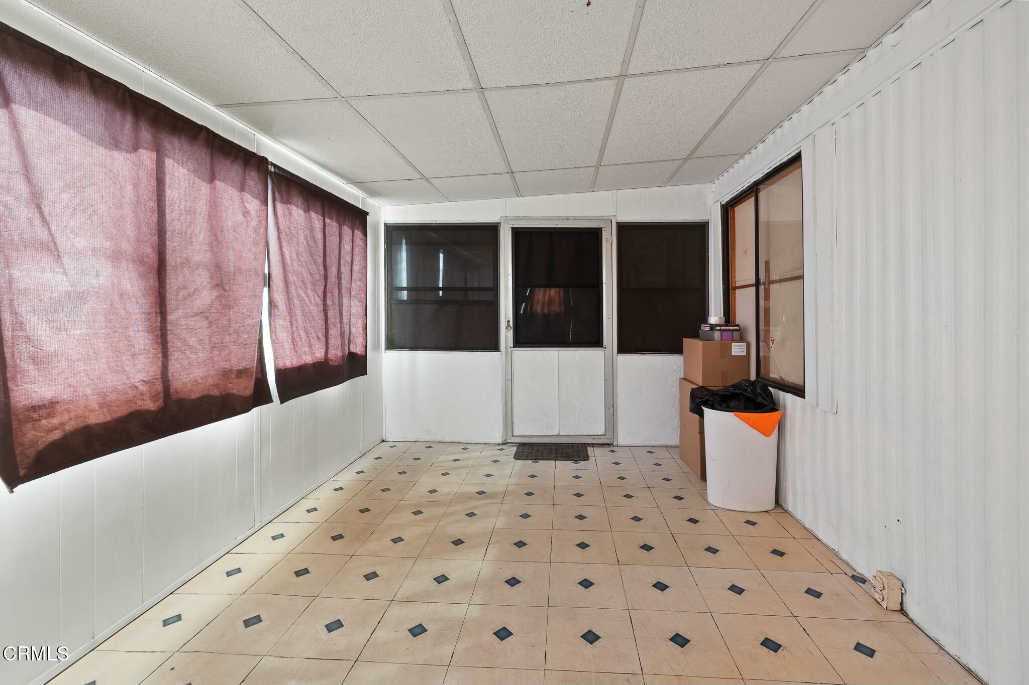 1853 Ives Avenue, Unit 51 Oxnard, CA 93033 - Photo 6 of 38 a bathroom with a bathtub and shower