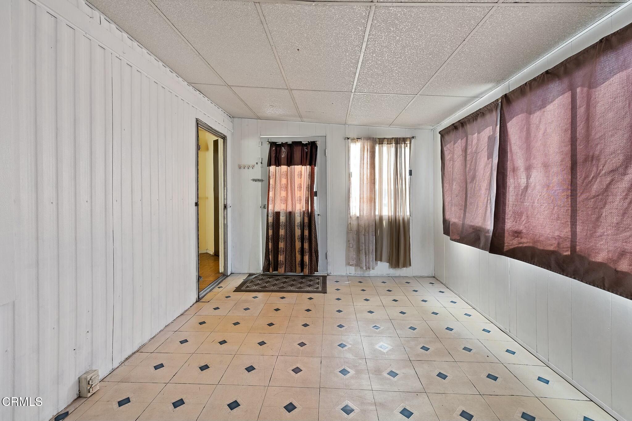 1853 Ives Avenue, Unit 51 Oxnard, CA 93033 - Photo 7 of 38 a bathroom with a bathtub and shower