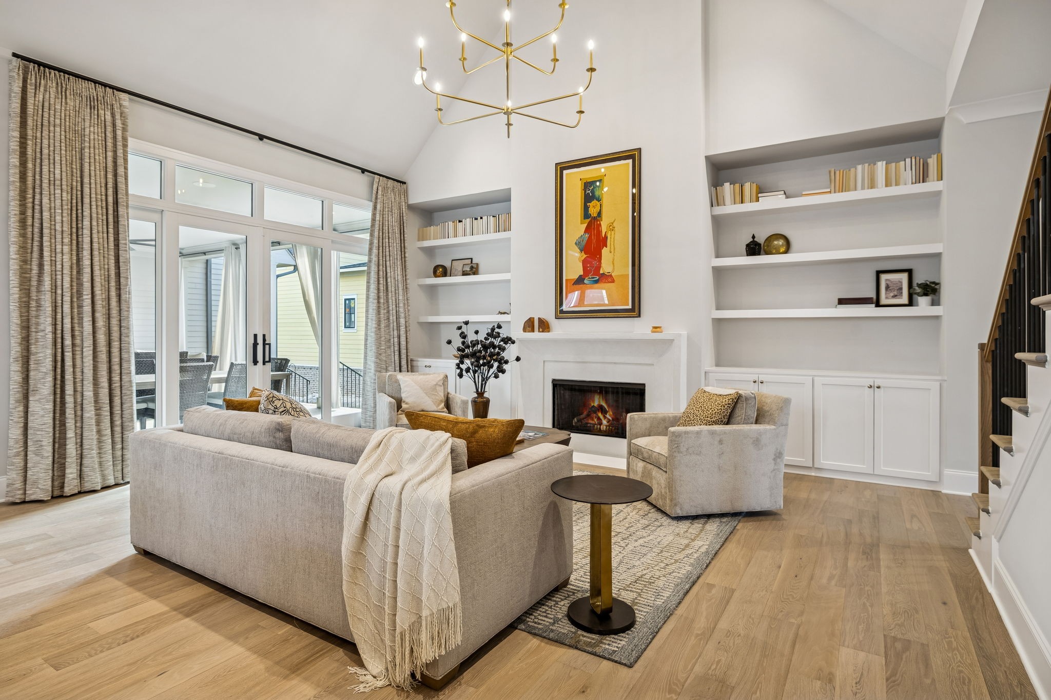 6080 Pasquo Road Nashville, TN 37221 - Photo 15 of 76 a living room with furniture and a fireplace