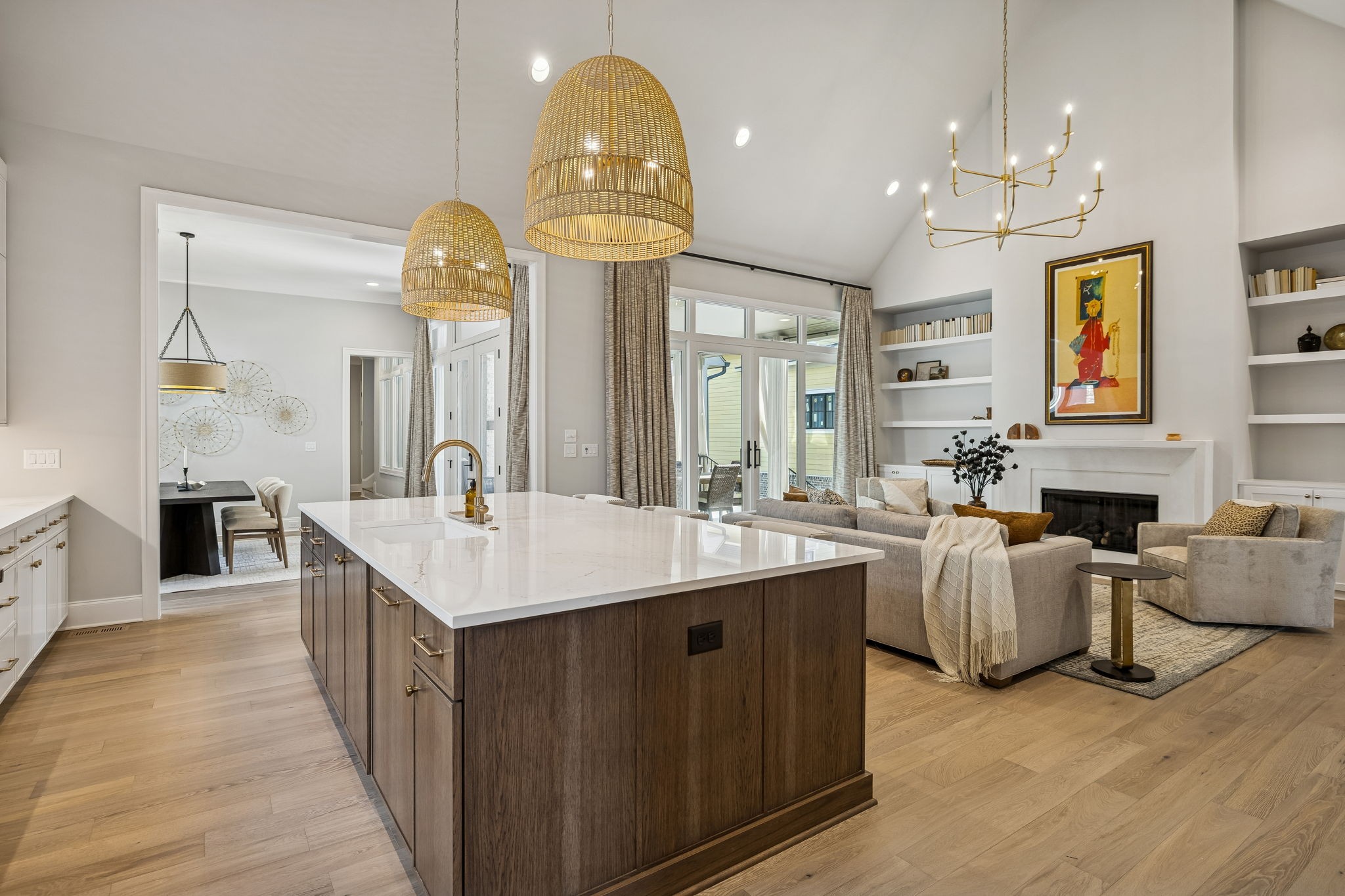 6080 Pasquo Road Nashville, TN 37221 - Photo 21 of 76 a large kitchen with kitchen island a sink a stove and a dining table view