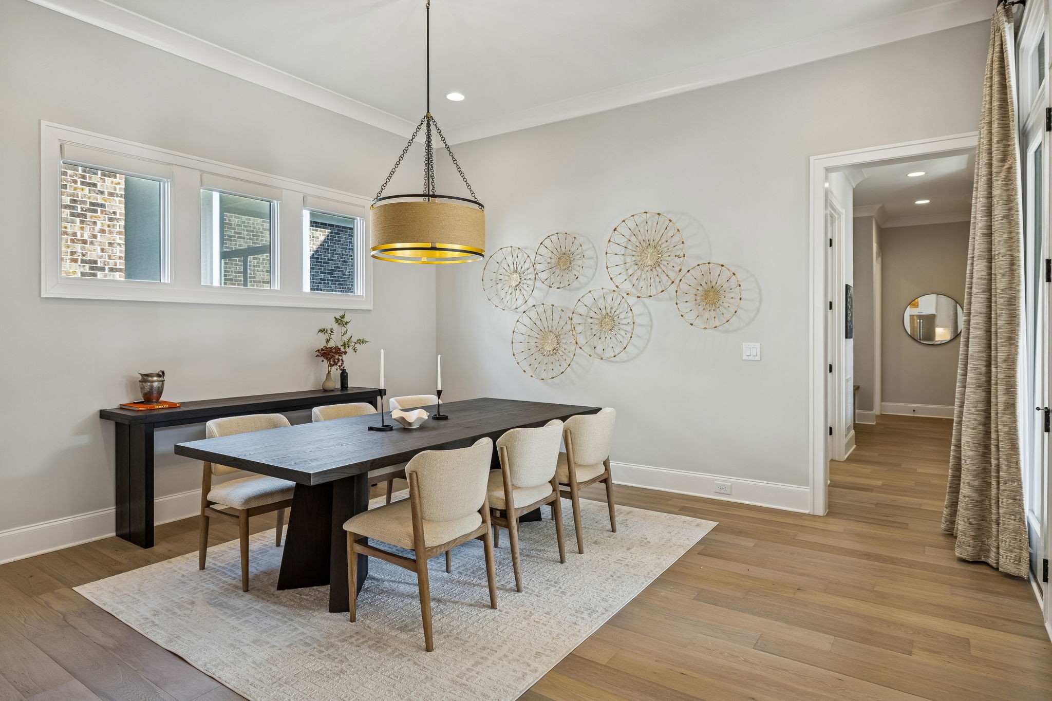 6080 Pasquo Road Nashville, TN 37221 - Photo 26 of 76 a view of a dining room with a table and chairs