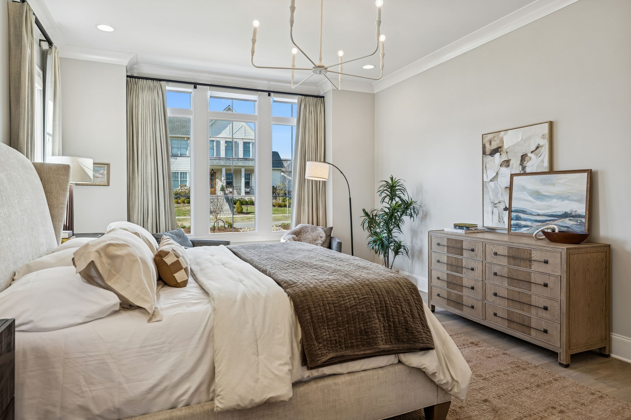 6080 Pasquo Road Nashville, TN 37221 - Photo 30 of 76 a bedroom with a bed and a dresser