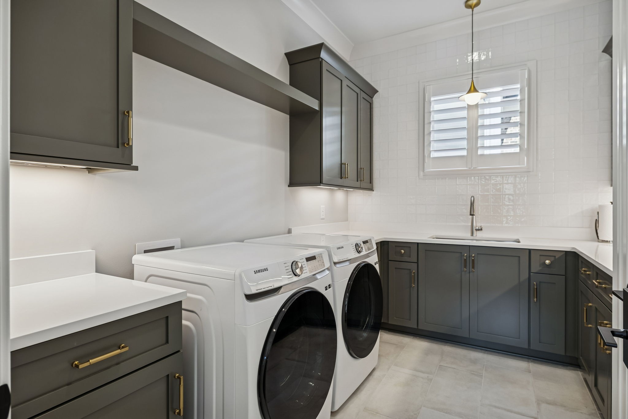 6080 Pasquo Road Nashville, TN 37221 - Photo 50 of 76 a utility room with sink dryer and washer