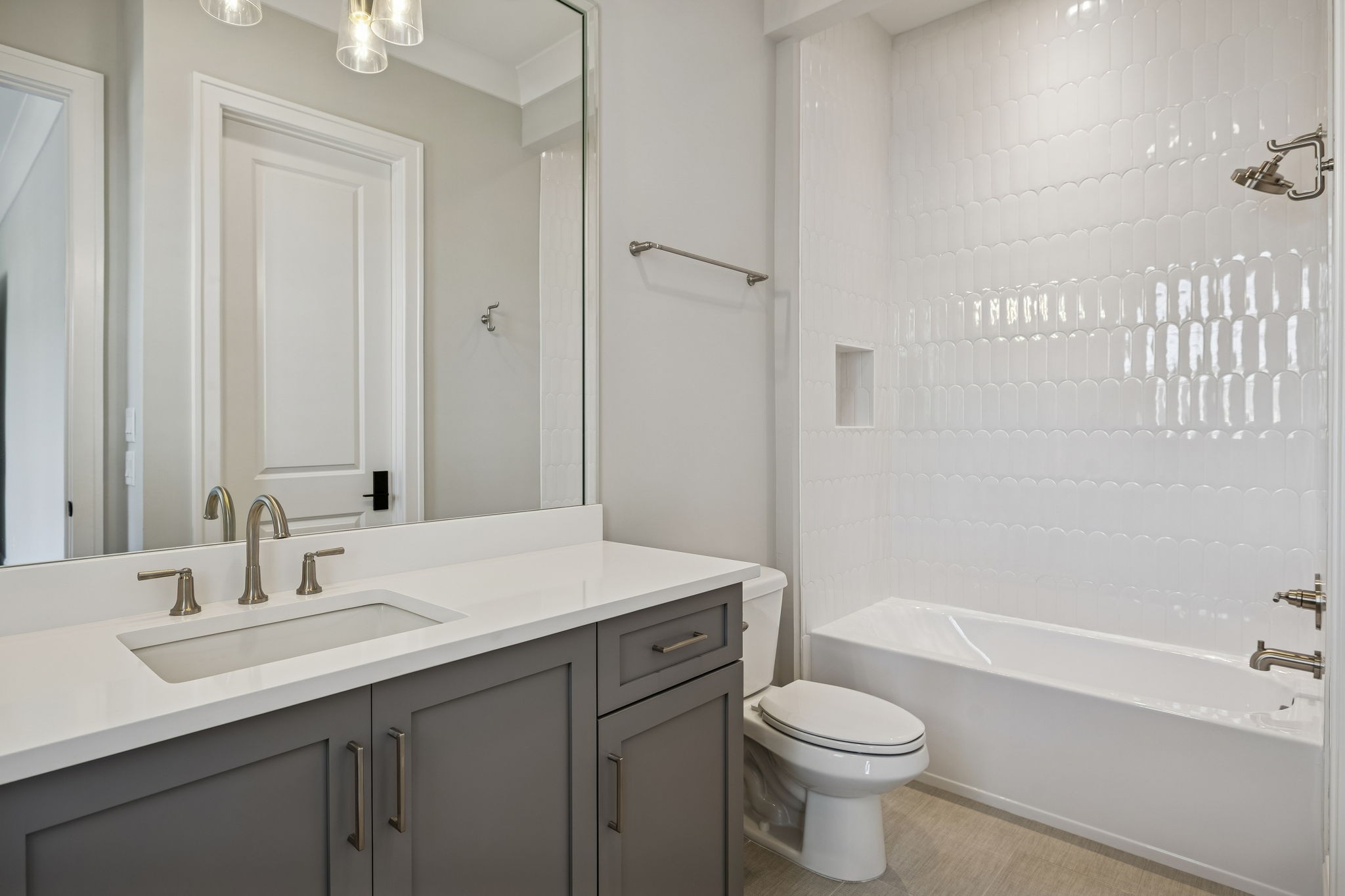 6080 Pasquo Road Nashville, TN 37221 - Photo 61 of 76 a bathroom with a sink a toilet and shower