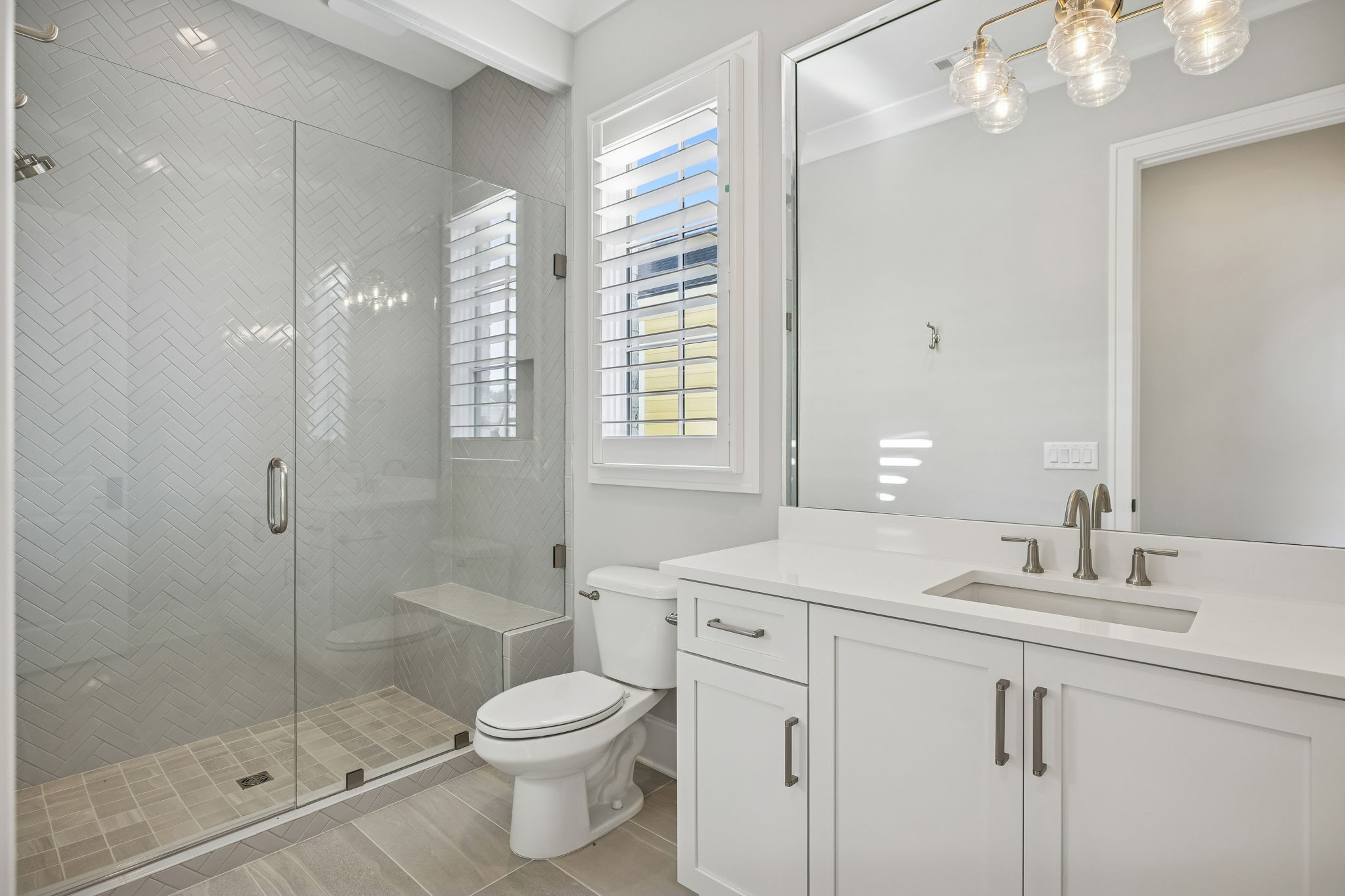 6080 Pasquo Road Nashville, TN 37221 - Photo 62 of 76 a bathroom with a sink a toilet and shower