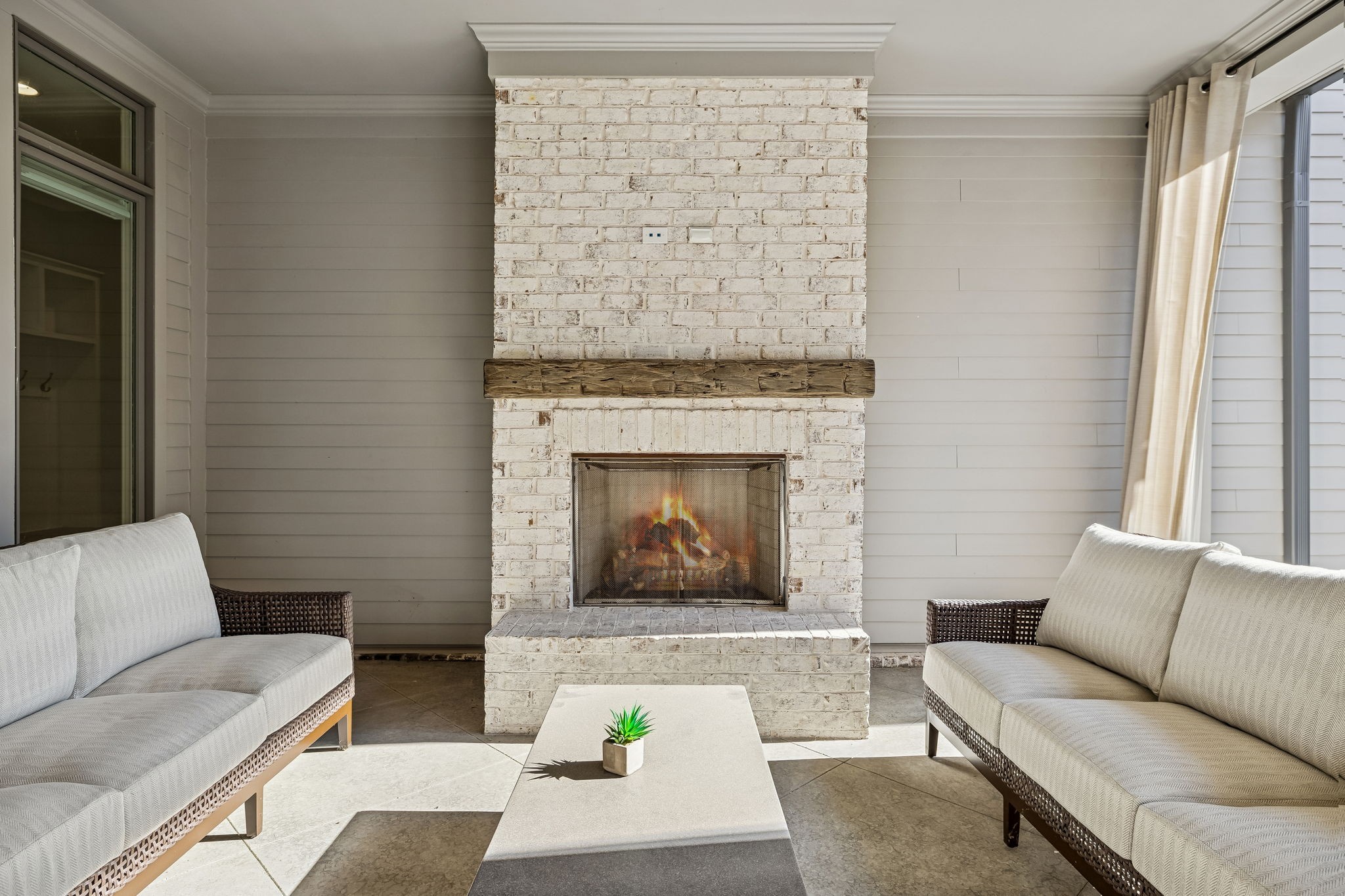 6080 Pasquo Road Nashville, TN 37221 - Photo 64 of 76 a living room with furniture and a fireplace