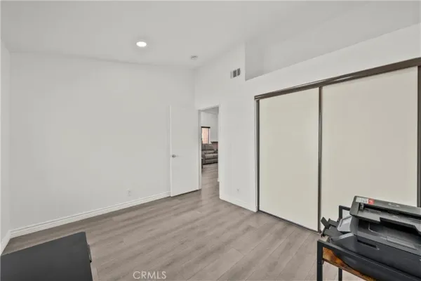 a view of workspace with wooden floor