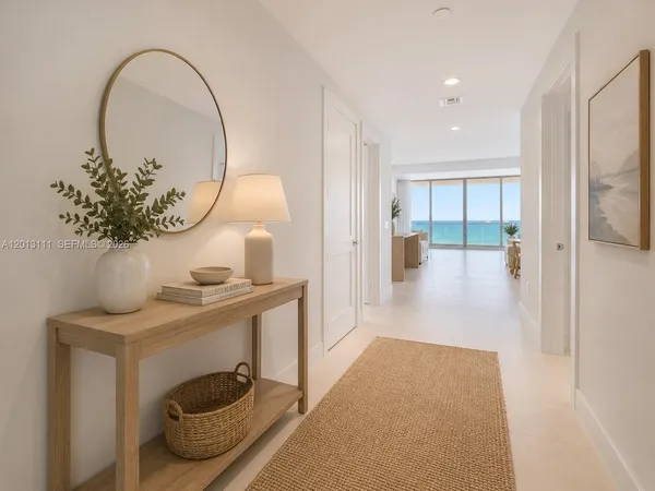 a view of entryway with kitchen