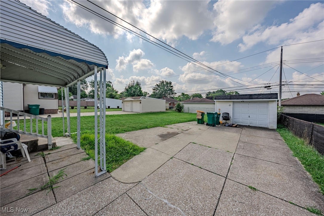 14804 Rockside Road Maple Heights, OH 44137 - Photo 6 of 44 View of patio / terrace with an outdoor structure and a detached garage