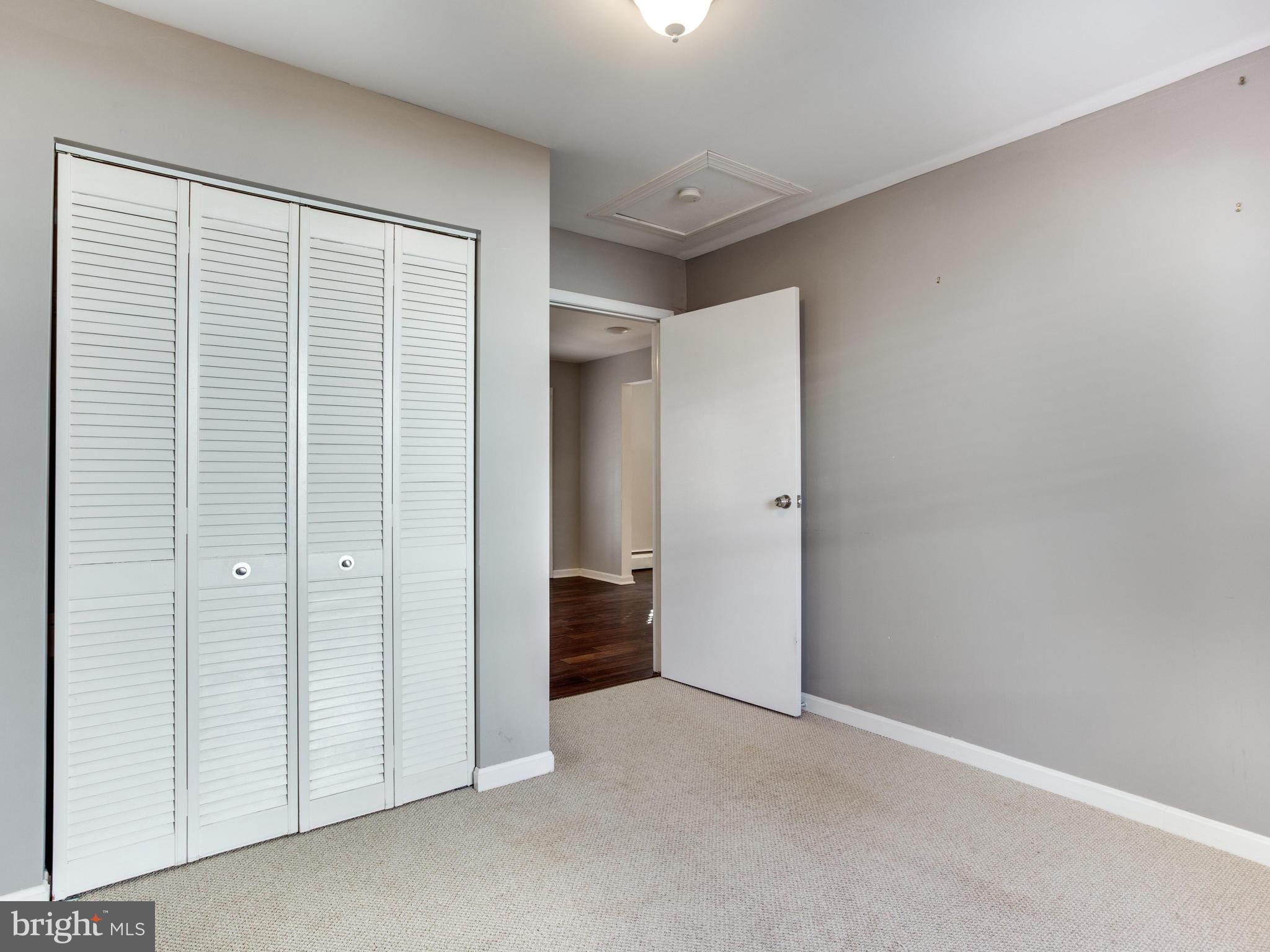 1240-7 Seven Oaks Road Baltimore, MD 21227 - Photo 11 of 23 Main level bedroom has adjoining full bath