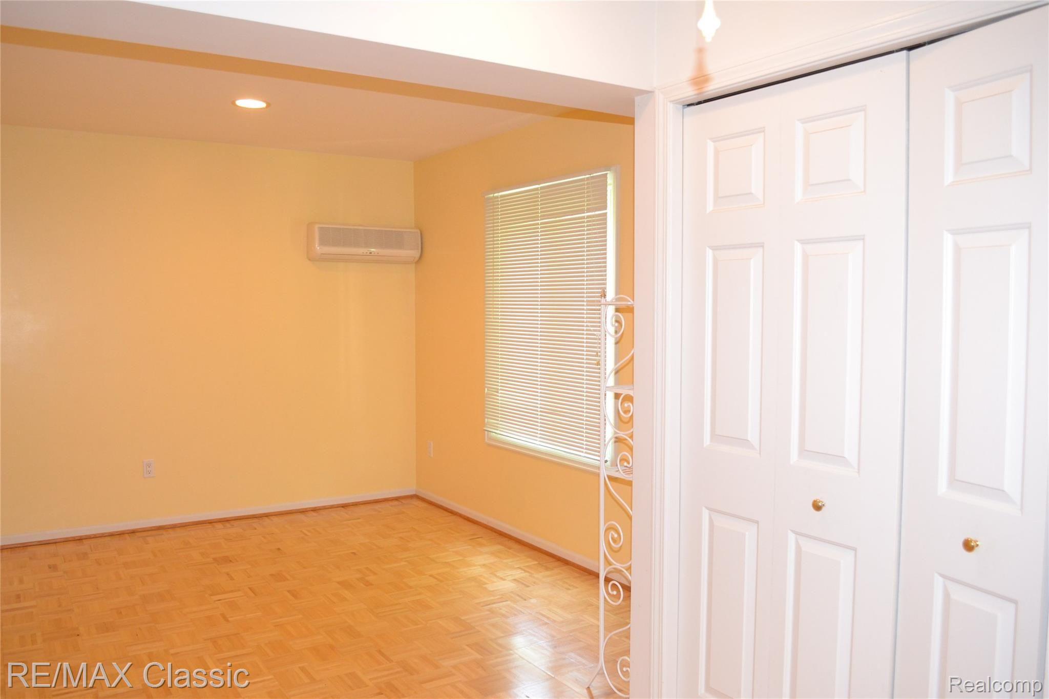 4443 Ravinewood Drive Commerce Township, MI 48382 - Photo 21 of 46 Attached Bedroom to Living Room