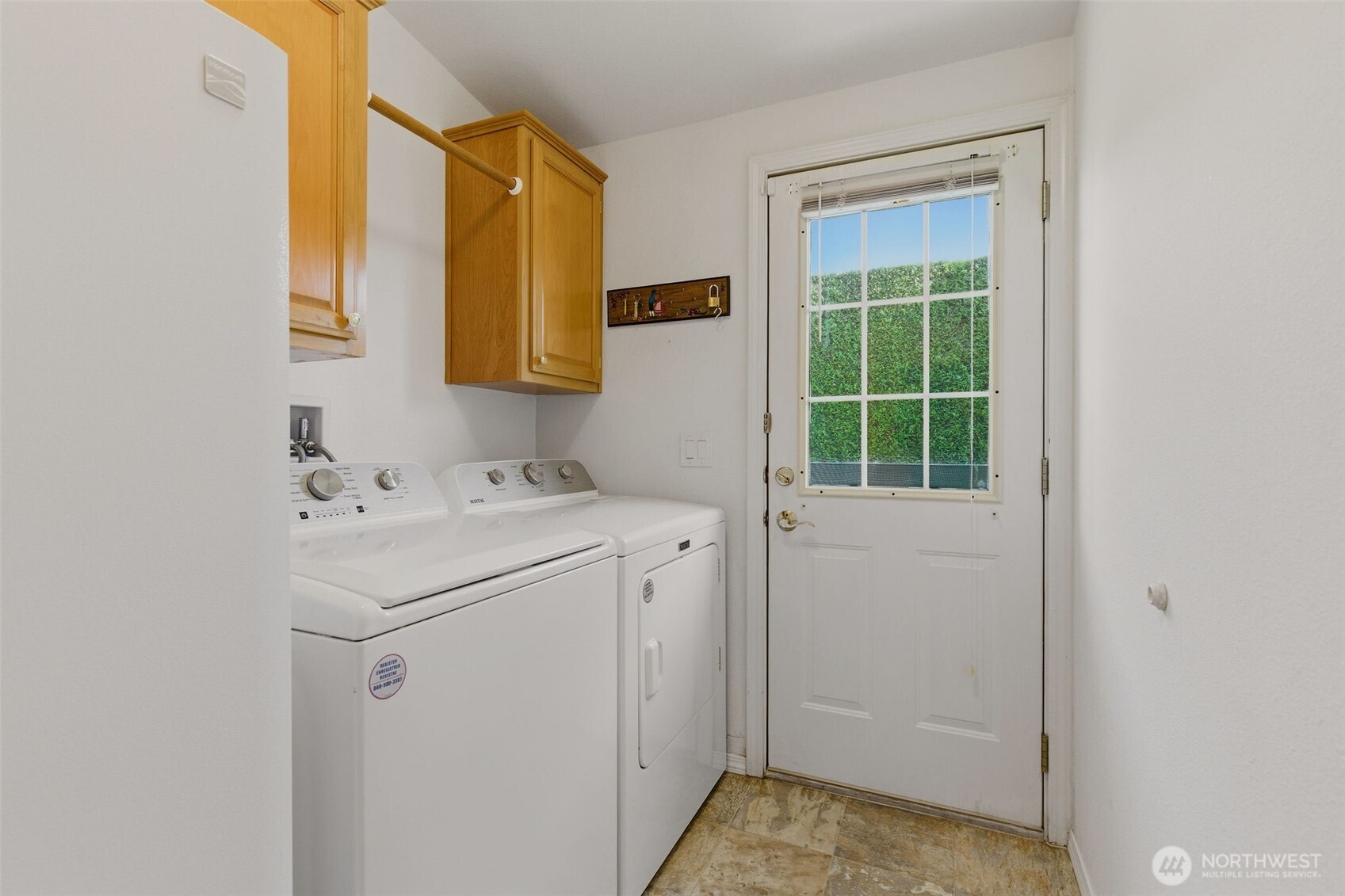 24036 222nd Avenue Southeast Maple Valley, WA 98038 - Photo 21 of 37 a utility room with dryer and washer