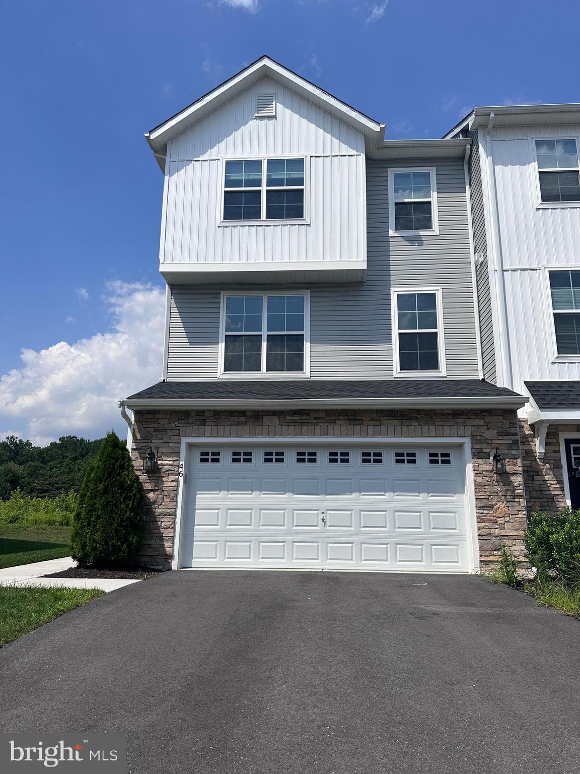 46 Aviary Road Thorofare, NJ 08086 - Photo 1 of 31 a front view of a house with a yard and garage
