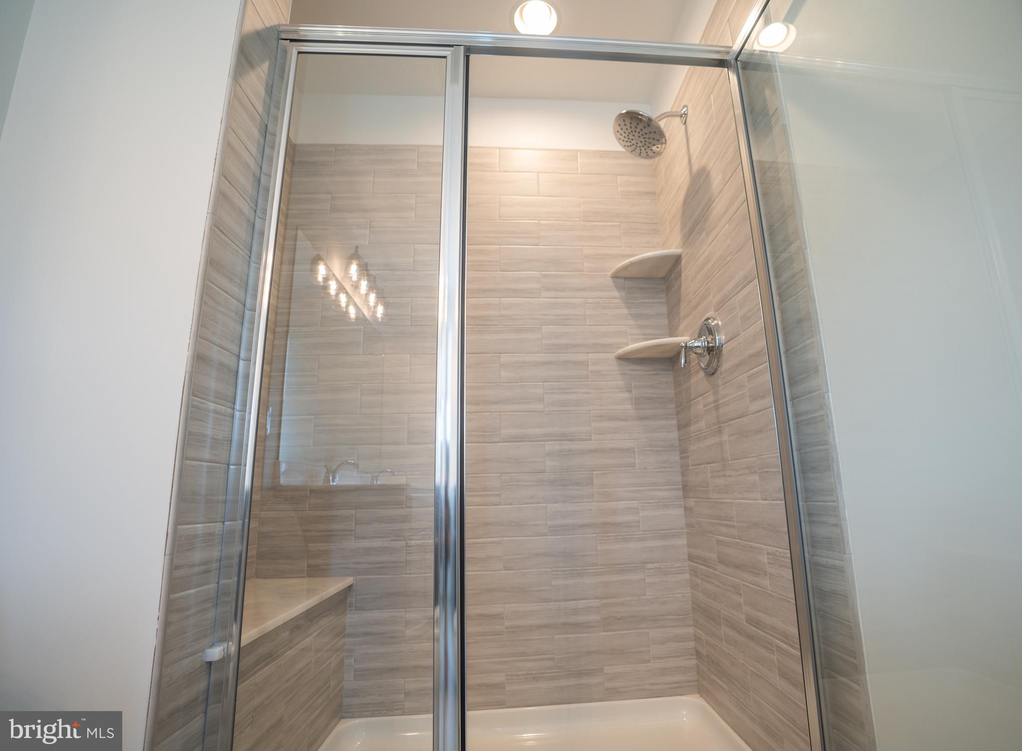 46 Aviary Road Thorofare, NJ 08086 - Photo 24 of 31 a bathroom with a glass shower door