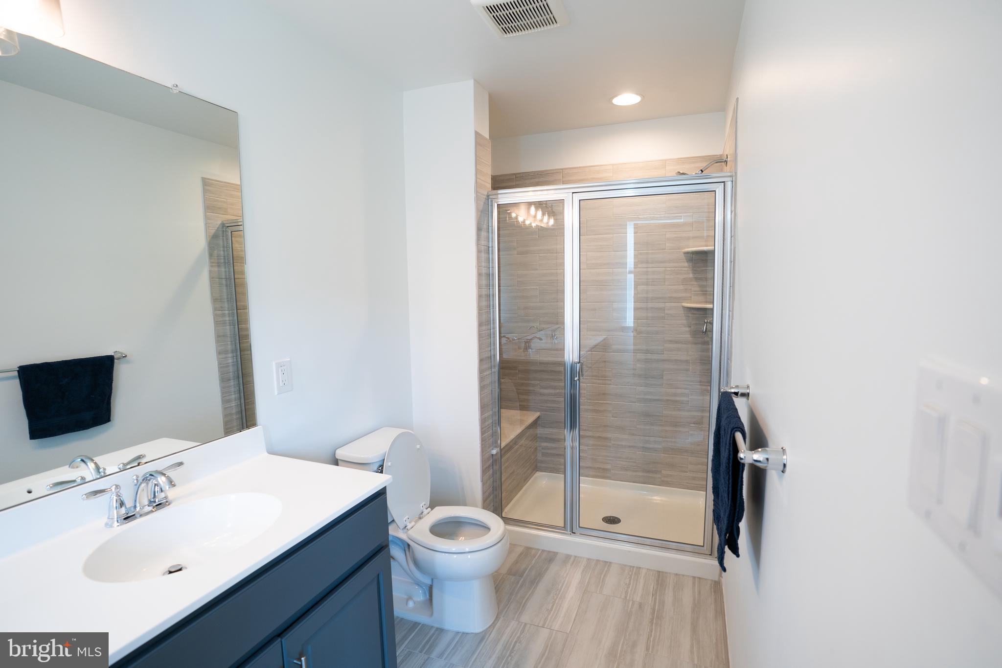 46 Aviary Road Thorofare, NJ 08086 - Photo 25 of 31 a bathroom with a sink a toilet and shower