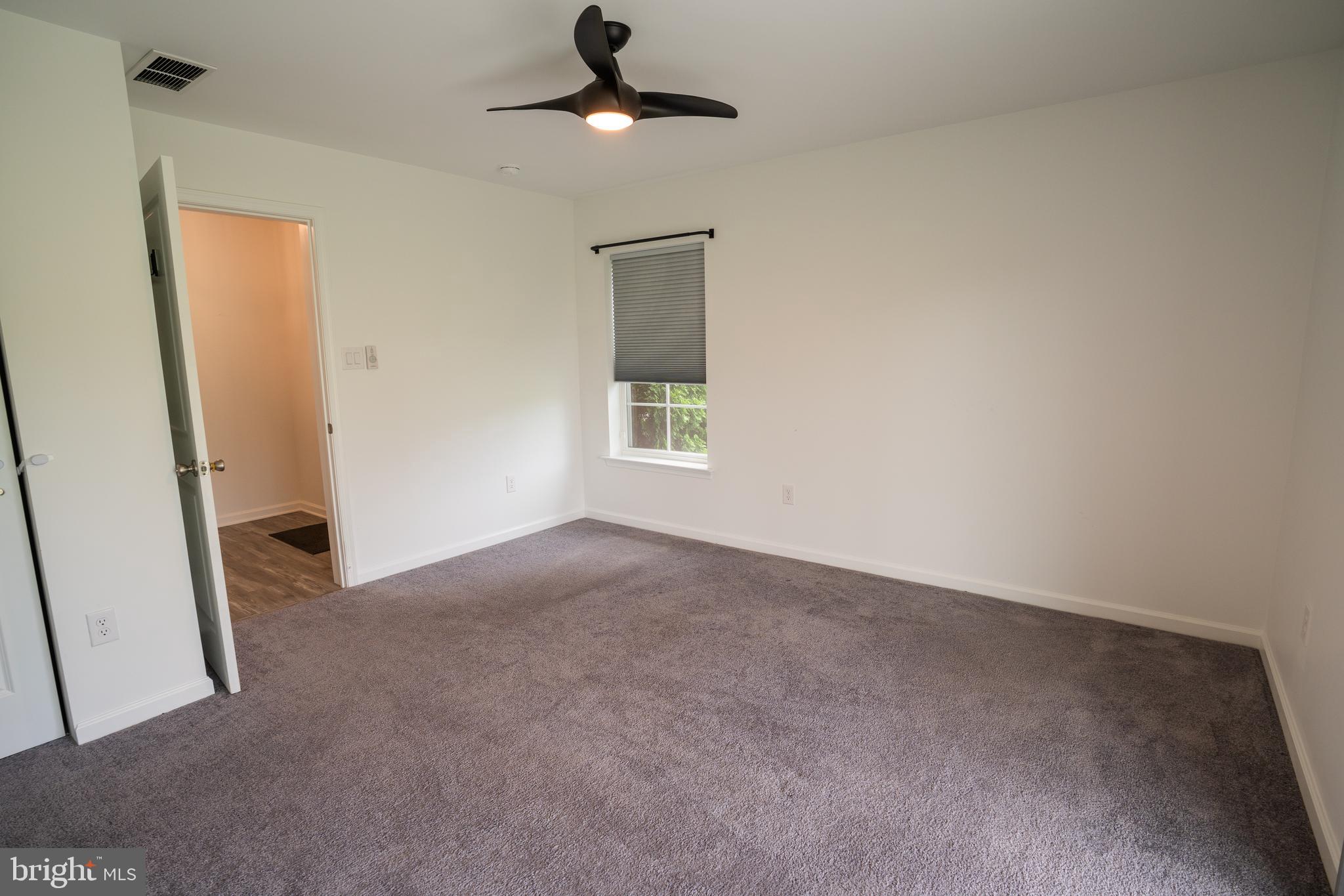 46 Aviary Road Thorofare, NJ 08086 - Photo 27 of 31 an empty room with windows and fan