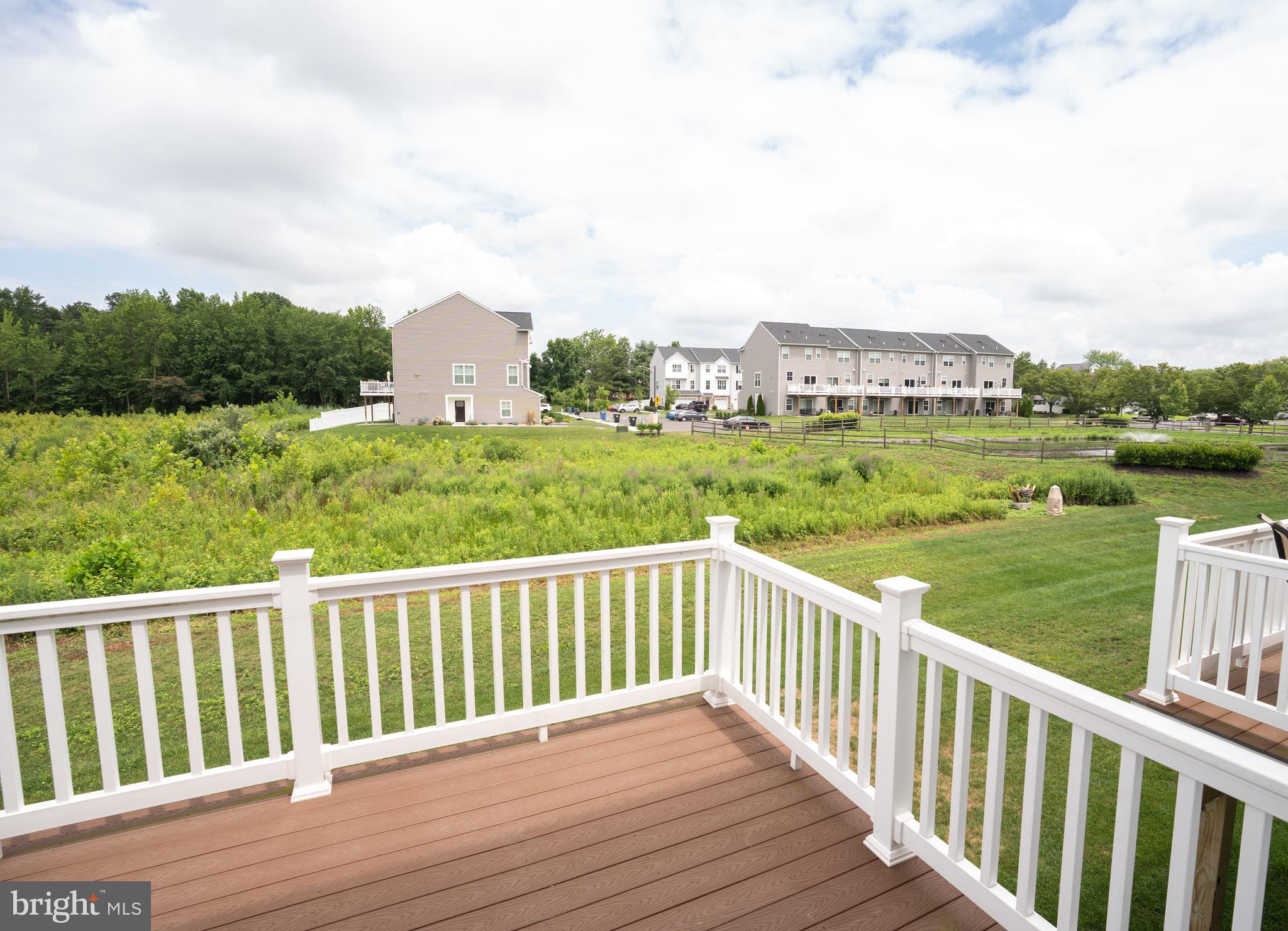 46 Aviary Road Thorofare, NJ 08086 - Photo 6 of 31 a view of a wooden deck and city view