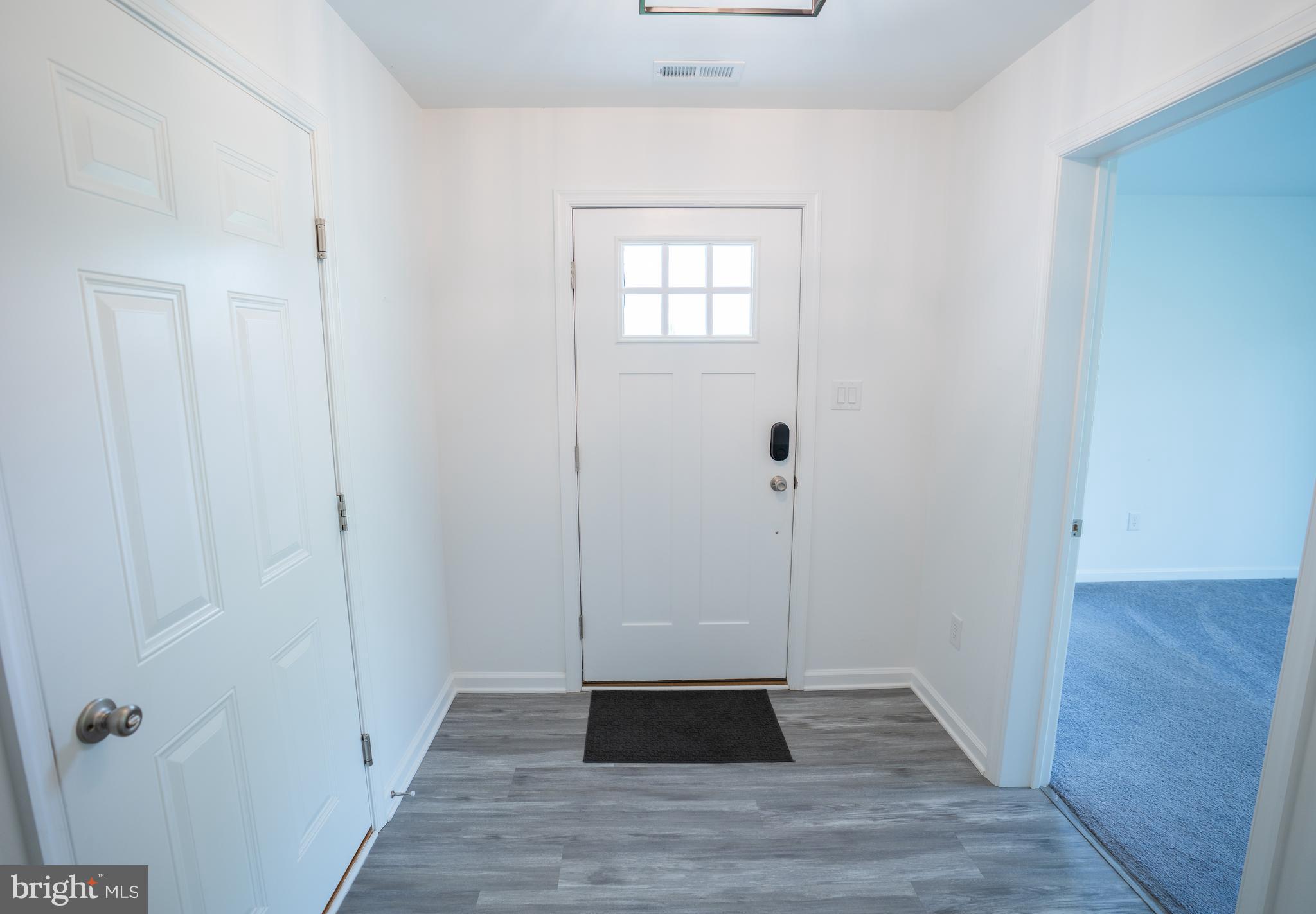 46 Aviary Road Thorofare, NJ 08086 - Photo 8 of 31 a view of a hallway with wooden floor and closet area