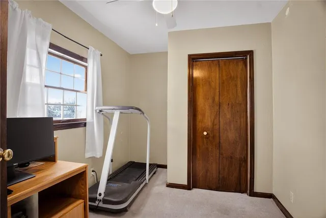 a view of workspace with gym equipment