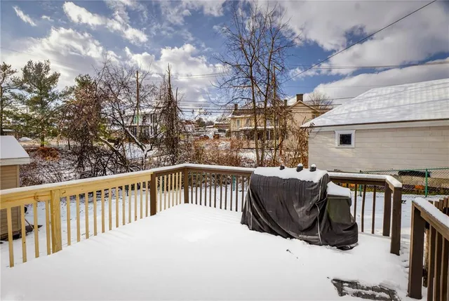 a view of balcony with furniture
