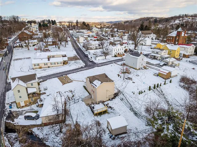 an aerial view of a city with lots of residential buildings