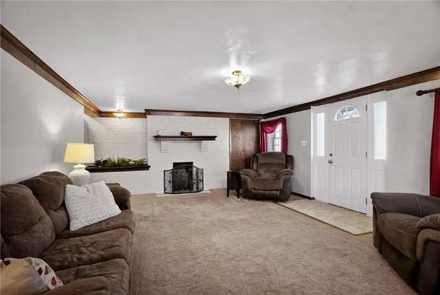 a living room with furniture and a couch