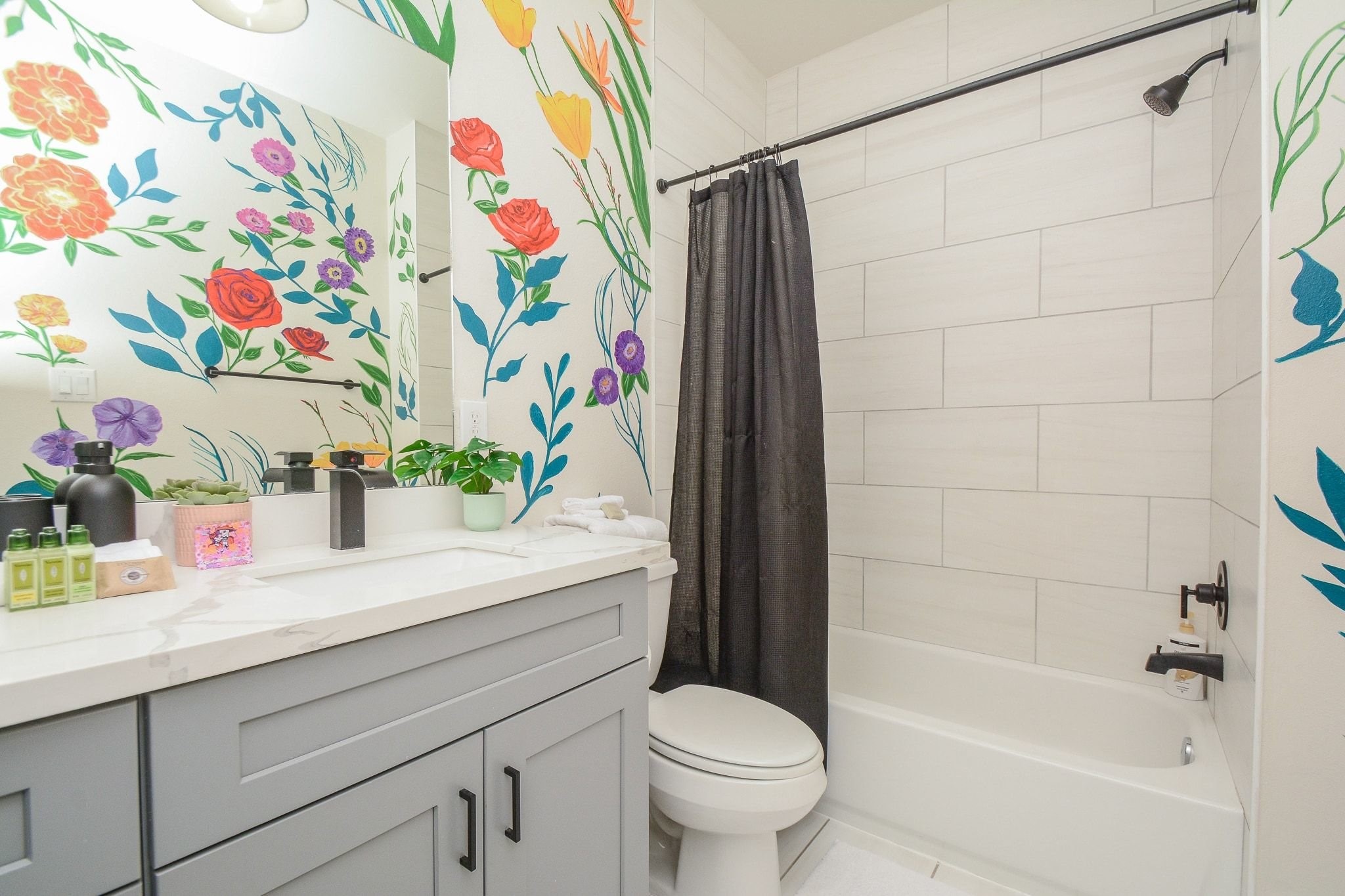 1504 Evelyn Street Houston, TX 77009 - Photo 13 of 15 a bathroom with a sink a toilet and a shower curtain