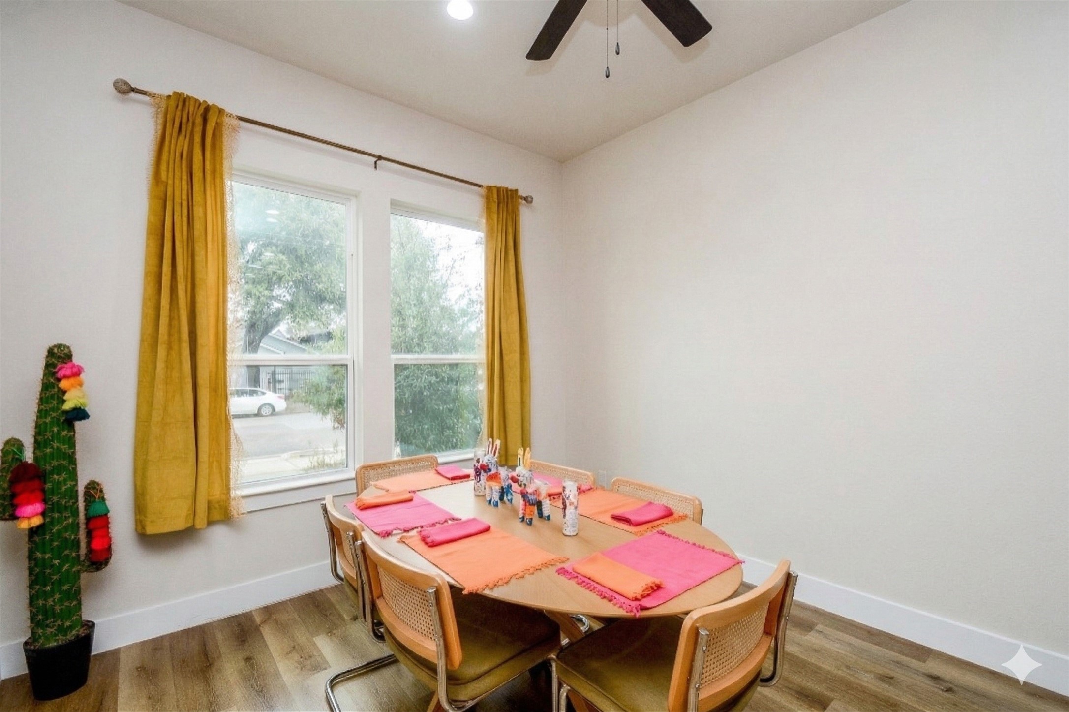 1504 Evelyn Street Houston, TX 77009 - Photo 5 of 15 a dining room with a table and chairs