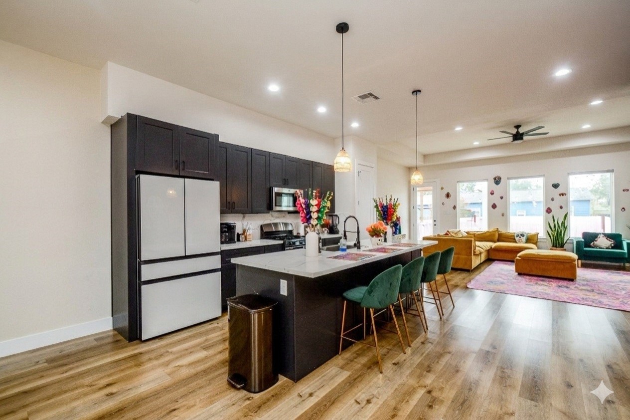 1504 Evelyn Street Houston, TX 77009 - Photo 6 of 15 a kitchen with lots of counter space and furniture