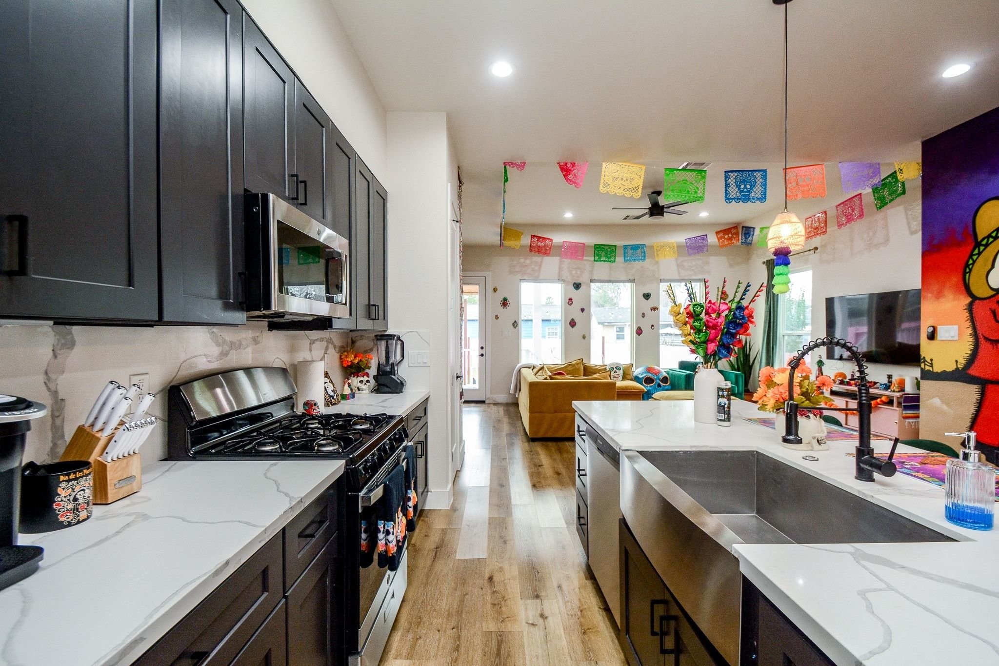 1504 Evelyn Street Houston, TX 77009 - Photo 7 of 15 a kitchen that has a lot of cabinets and appliances