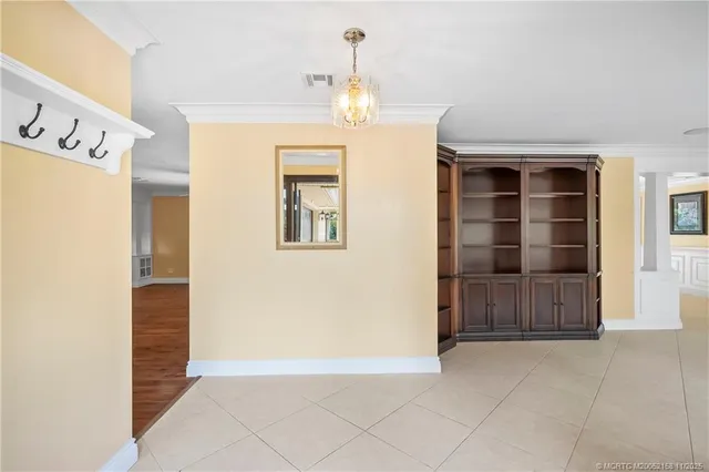 a kitchen with stainless steel appliances granite countertop a stove a sink and cabinets