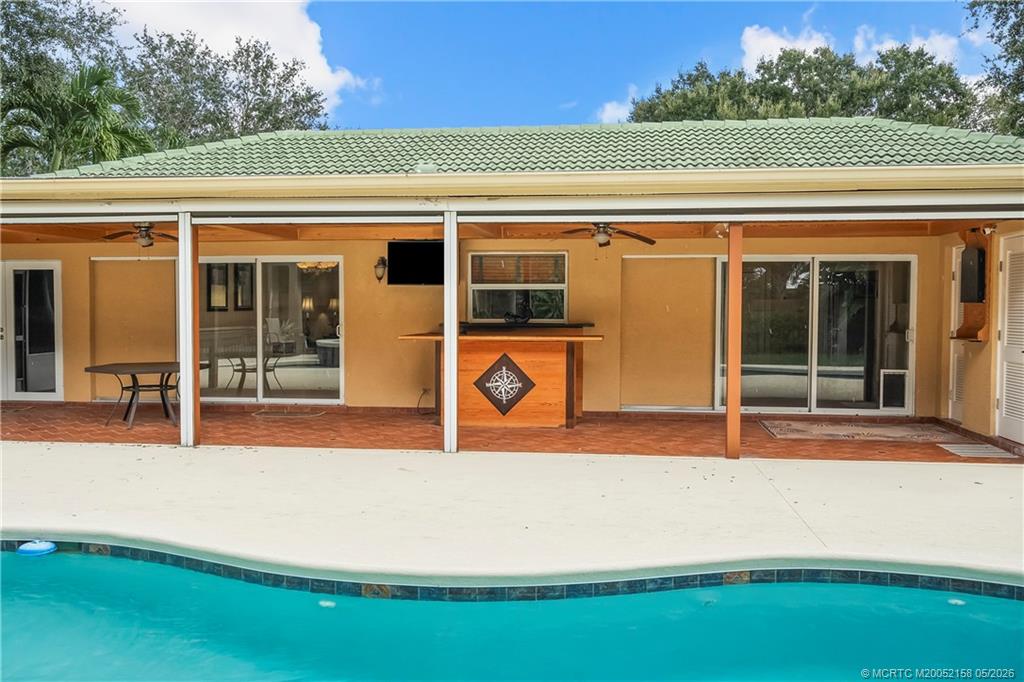 2164 Southeast St Lucie Boulevard Stuart, FL 34996 - Photo 42 of 60 covered patio with bar