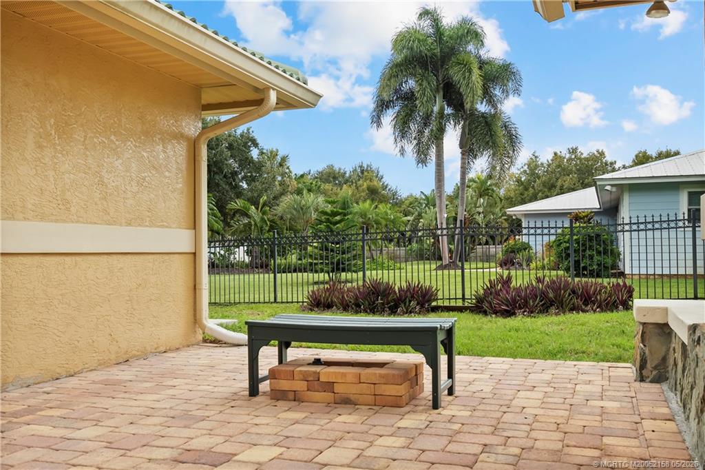2164 Southeast St Lucie Boulevard Stuart, FL 34996 - Photo 53 of 60 cozy patio outside of garage