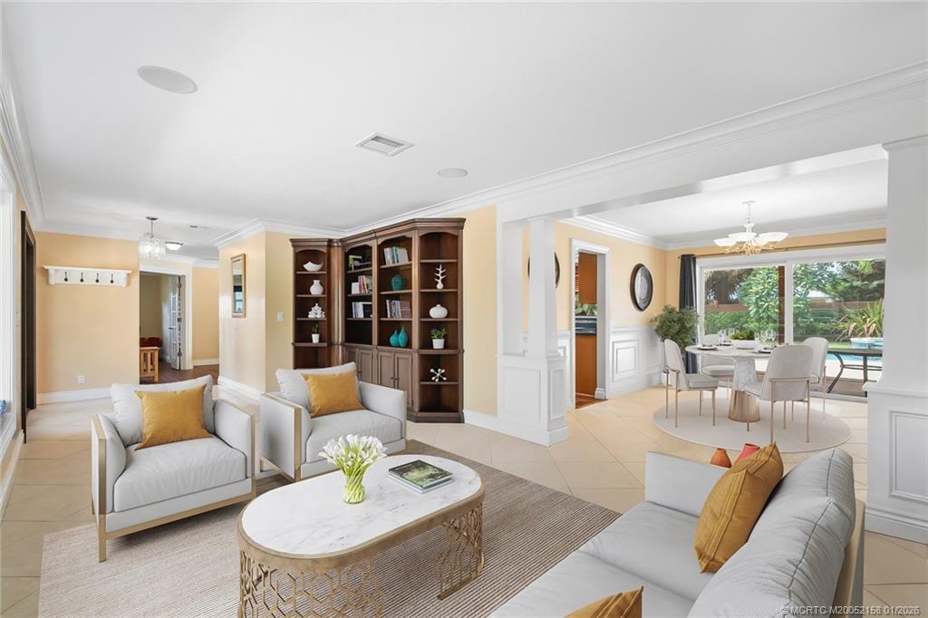 2164 Southeast St Lucie Boulevard Stuart, FL 34996 - Photo 8 of 60 living room open to dining room - virtual staging