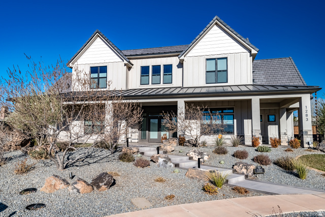 1283 North Gallen Road Santa Clara, UT 84765 - Photo 7 of 103 Modern inspired farmhouse with board and batten siding, a porch, and a standing seam roof
