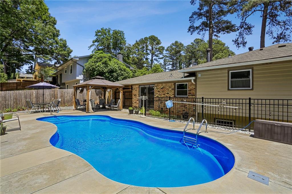 2740 Frontier Trail Atlanta, GA 30341 - Photo 4 of 29 a view of house with swimming pool outdoor seating