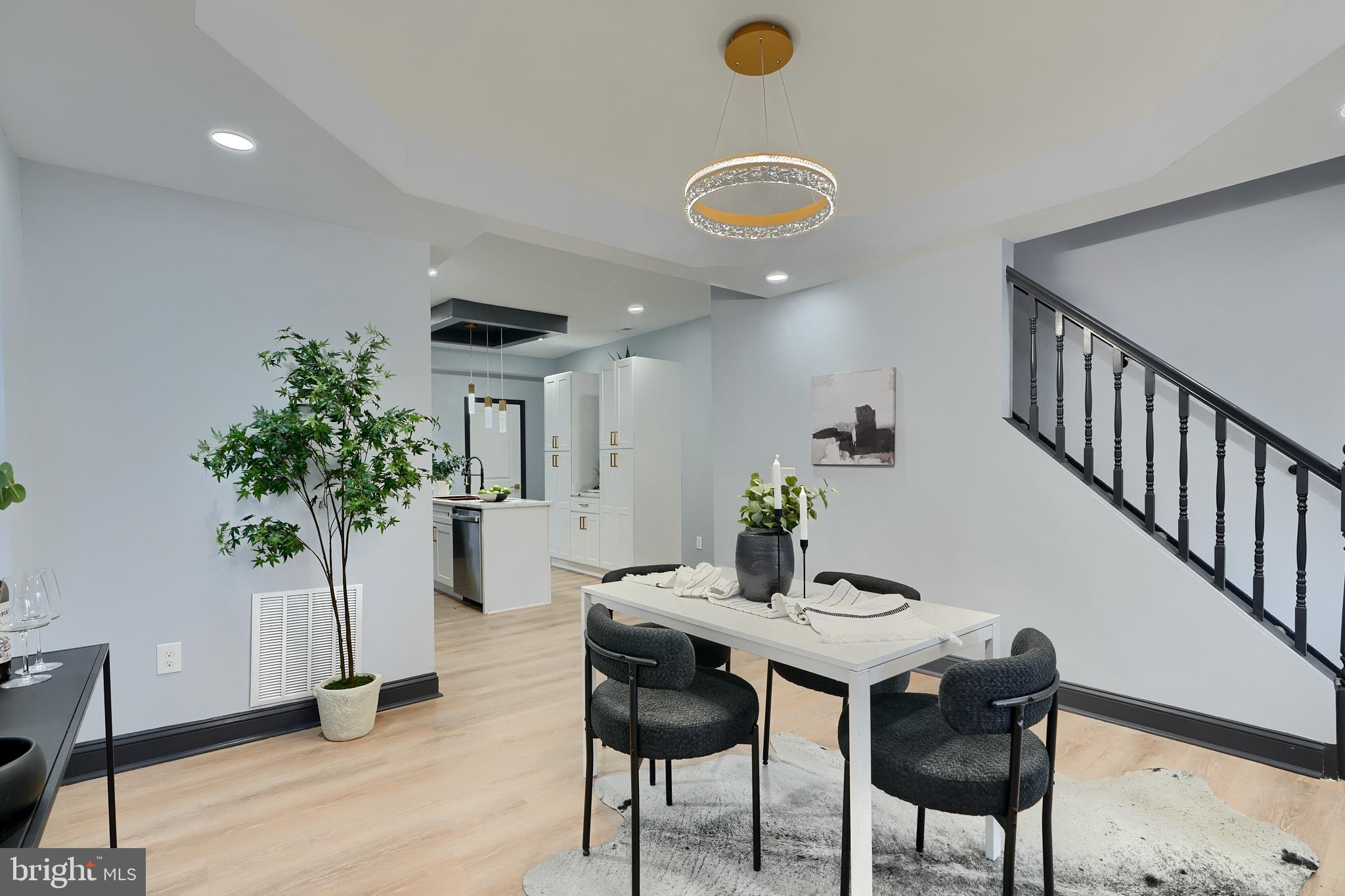 5012 Belair Road Baltimore, MD 21206 - Photo 20 of 61 a view of a dining room with furniture and wooden floor