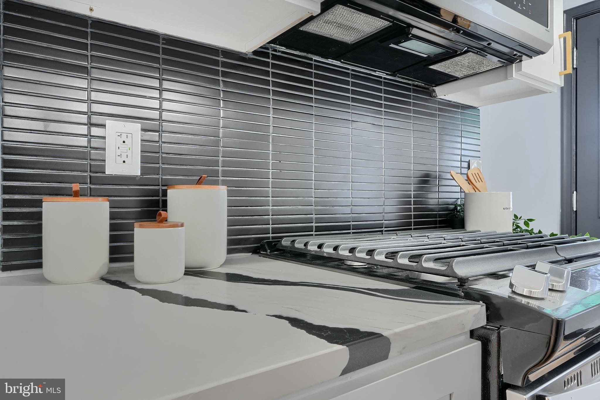 5012 Belair Road Baltimore, MD 21206 - Photo 28 of 61 a kitchen with a stove and a sink