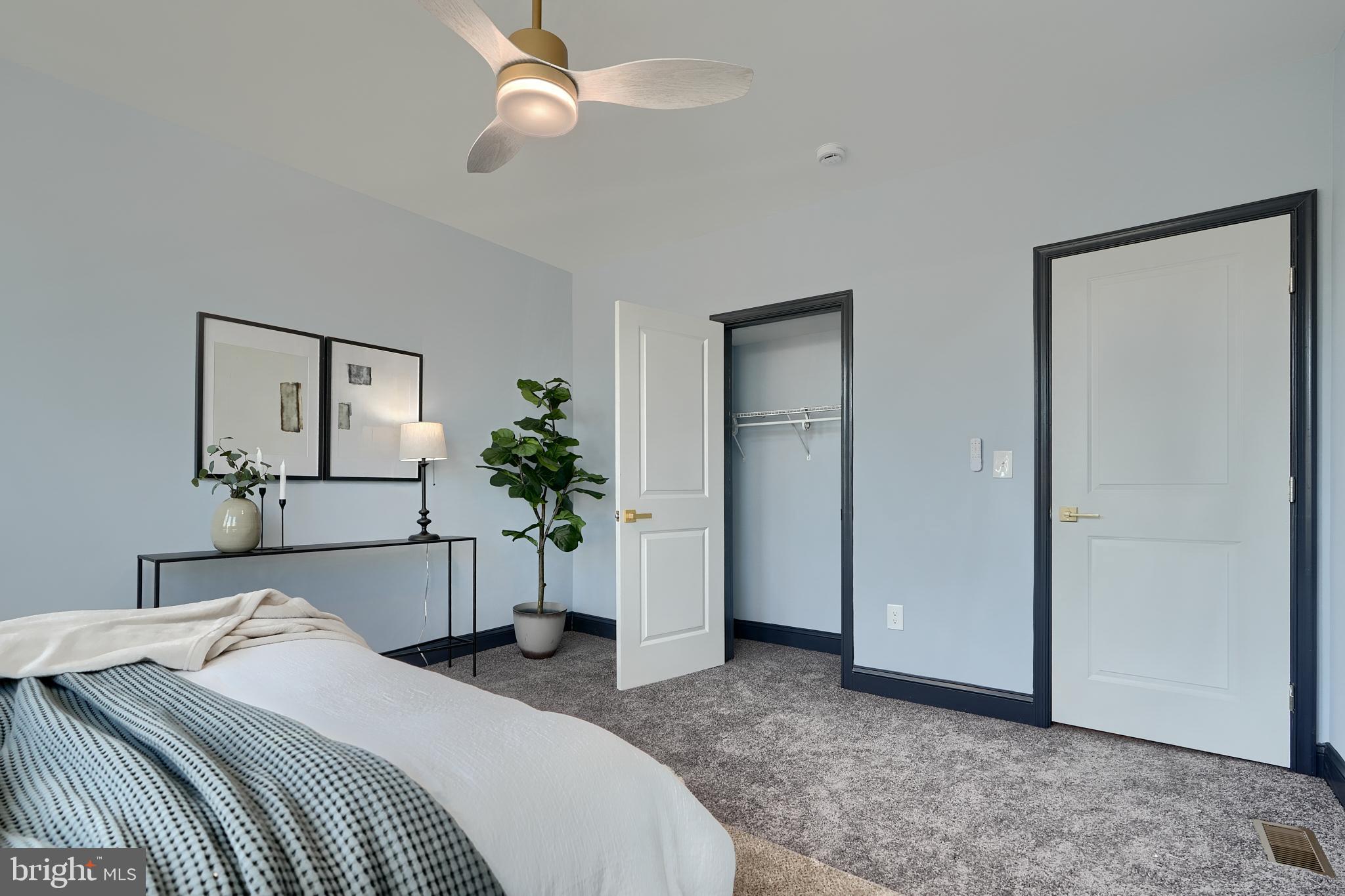 5012 Belair Road Baltimore, MD 21206 - Photo 40 of 61 a bedroom with a bed and a mirror