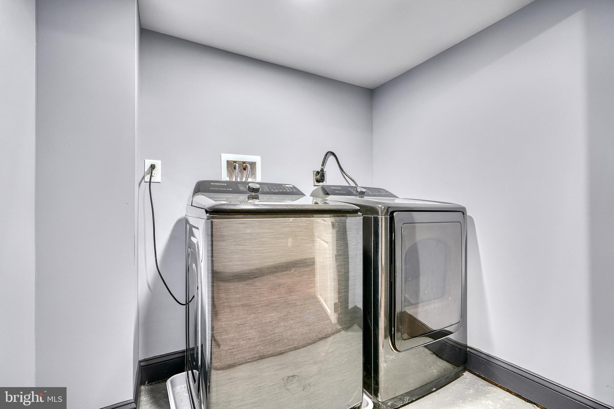 5012 Belair Road Baltimore, MD 21206 - Photo 51 of 61 a utility room with dryer and washer