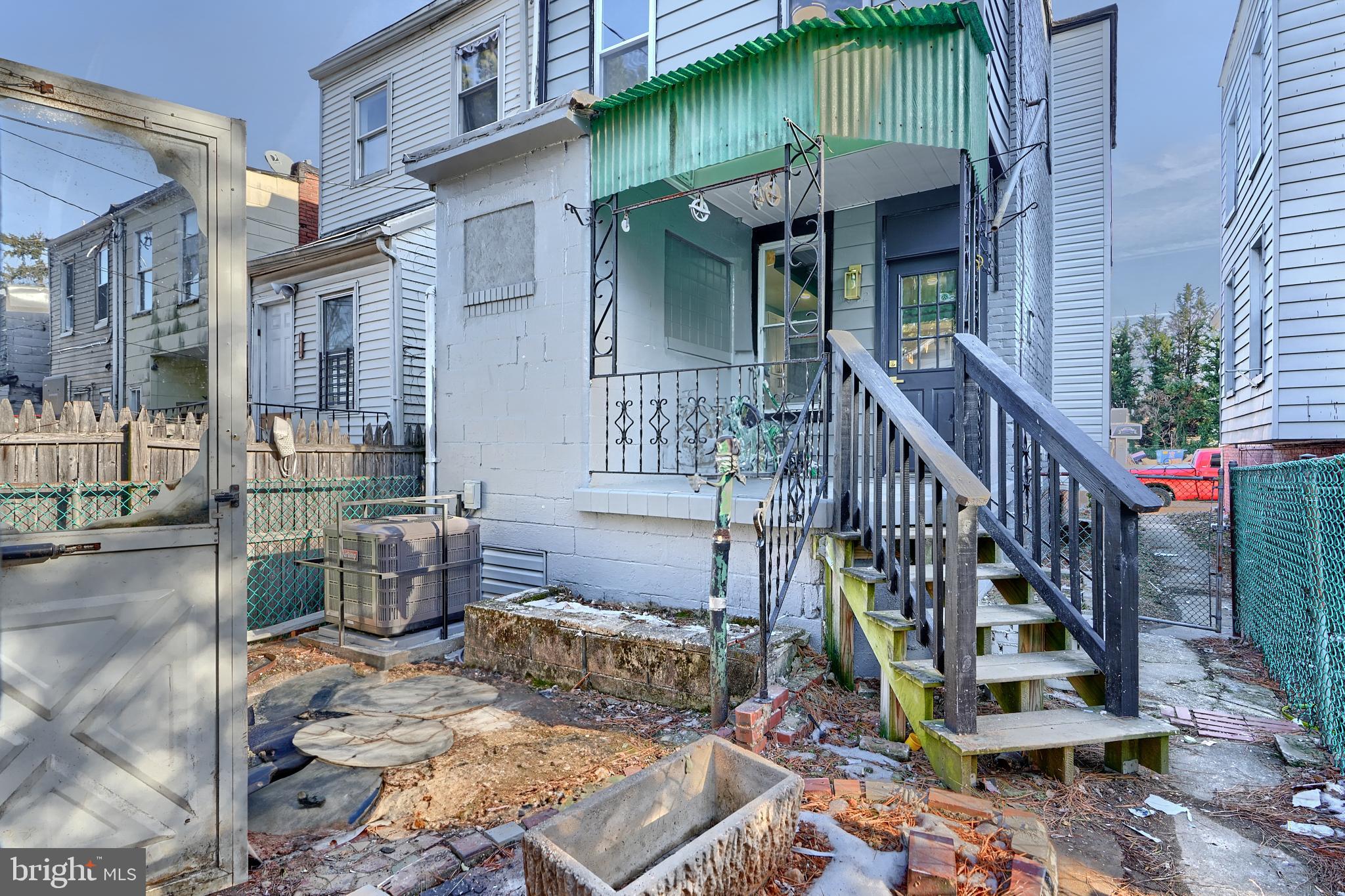 5012 Belair Road Baltimore, MD 21206 - Photo 57 of 61 a view of a house with backyard and sitting area