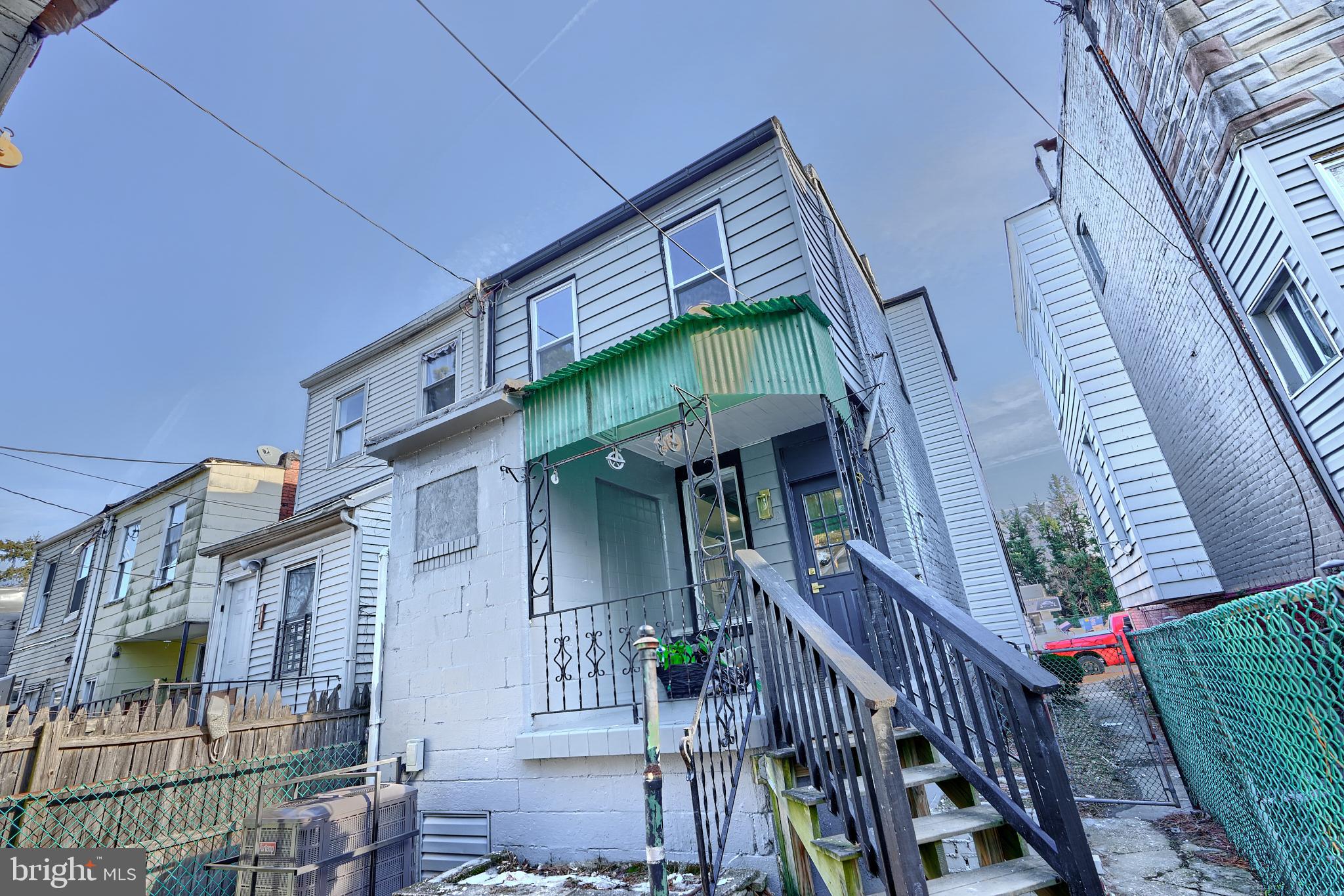 5012 Belair Road Baltimore, MD 21206 - Photo 59 of 61 a yellow house with outdoor space