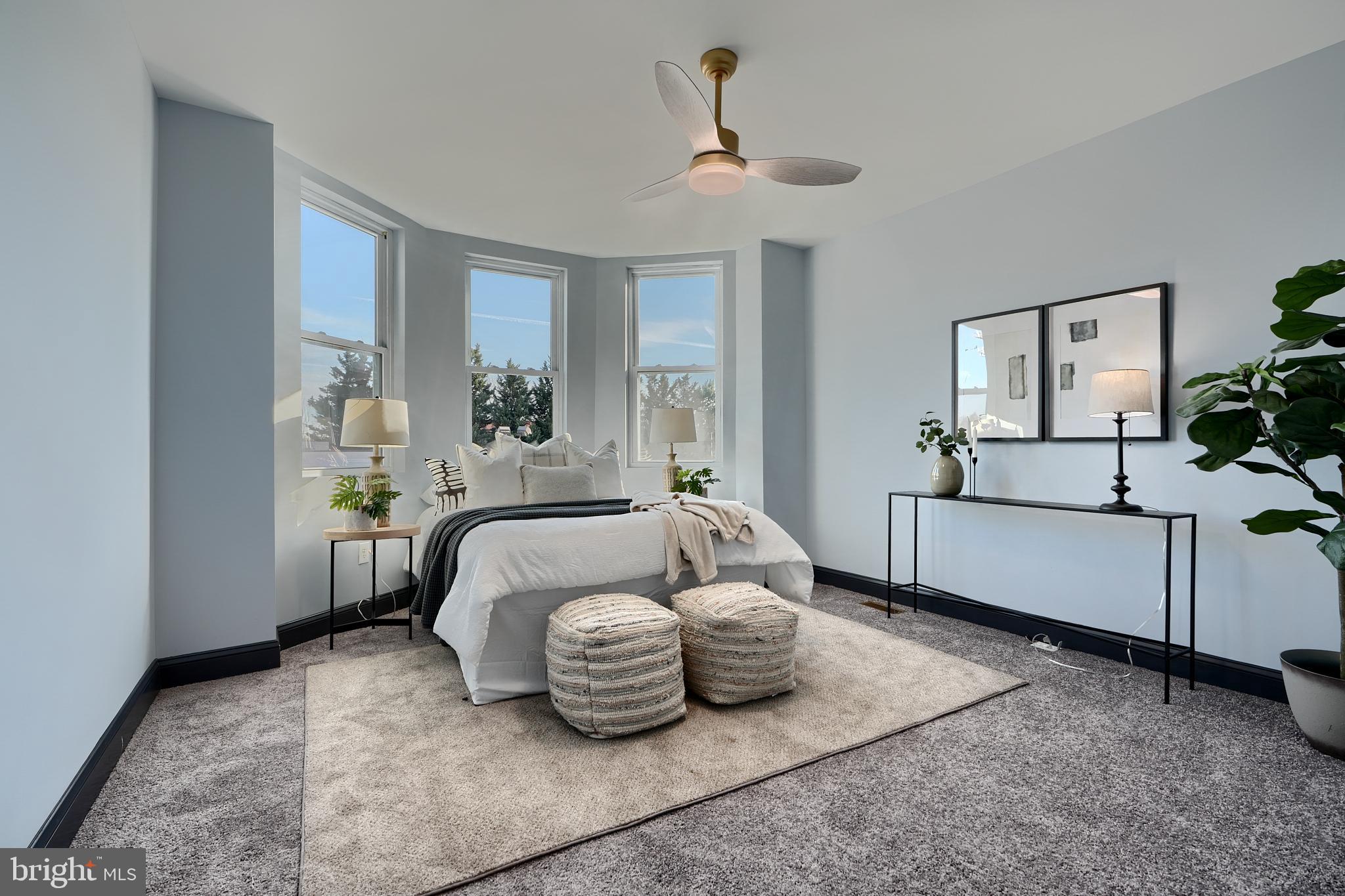 5012 Belair Road Baltimore, MD 21206 - Photo 6 of 61 a spacious bedroom with a bed and window